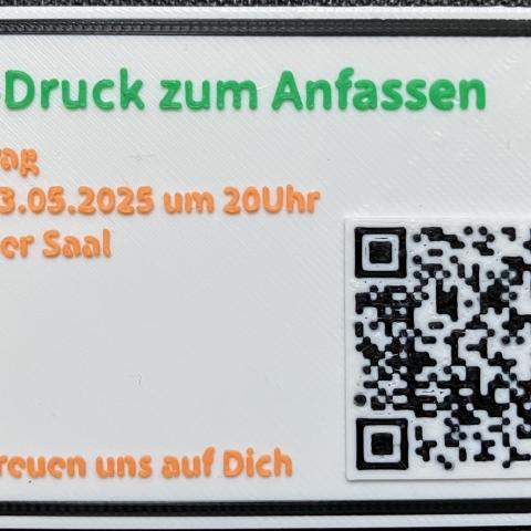 Eine mehrfarbig gedruckte Visitenkarte als Einladung für den Vortragstermin